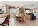 Bright dining area adjacent to kitchen and living room at 4714 Potomac Cir, Bradenton, FL 34210