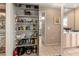 Well-organized pantry with ample shelving at 4714 Potomac Cir, Bradenton, FL 34210