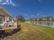 Canal view from a patio area with seating at 4714 Potomac Cir, Bradenton, FL 34210