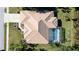 Bird's-eye view of a single-Gathering home with a pool and a tile roof at 4821 Hanging Moss Ln, Sarasota, FL 34238