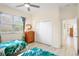 Guest bedroom with twin beds and ample closet space at 4821 Hanging Moss Ln, Sarasota, FL 34238