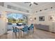 Bright dining room with pool and patio view, seating for six at 4821 Hanging Moss Ln, Sarasota, FL 34238