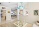 Light and airy living room with a view into the dining room at 4821 Hanging Moss Ln, Sarasota, FL 34238