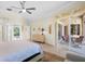 Main bedroom with private access to the pool and patio at 4821 Hanging Moss Ln, Sarasota, FL 34238