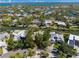 Aerial view of waterfront homes and canal at 4857 Primrose Path, Sarasota, FL 34242