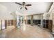 Large bedroom with hardwood floors and mirrored closet, undergoing renovations at 4857 Primrose Path, Sarasota, FL 34242