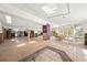 Dining area with hardwood floors and large windows at 4857 Primrose Path, Sarasota, FL 34242