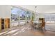 Dining area with water views and hardwood floors at 4857 Primrose Path, Sarasota, FL 34242