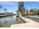 Serene waterfront property showcasing a canal view and seawall at 4857 Primrose Path, Sarasota, FL 34242