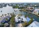 Luxury waterfront home with private dock and lush landscaping at 512 Bayview Pl, Anna Maria, FL 34216