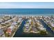 Aerial view of waterfront home with private dock and pool at 512 Bayview Pl, Anna Maria, FL 34216