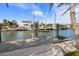 Private boat lift and dock with waterfront access at 512 Bayview Pl, Anna Maria, FL 34216