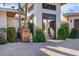 House entrance with custom metal pineapple design feature at 512 Bayview Pl, Anna Maria, FL 34216