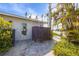 Outdoor shower with patio and waterfront views at 512 Bayview Pl, Anna Maria, FL 34216