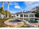 Enjoy this large hot tub with surrounding stonework at 512 Bayview Pl, Anna Maria, FL 34216