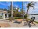 Enjoy this relaxing patio area with outdoor seating at 512 Bayview Pl, Anna Maria, FL 34216