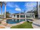 Large freeform pool and spa with water views at 512 Bayview Pl, Anna Maria, FL 34216