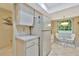 Kitchen with white appliances and breakfast nook at 5248 Marshfield Ln # 2, Sarasota, FL 34235