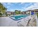 Inviting community pool with ample lounge chairs at 5248 Marshfield Ln # 2, Sarasota, FL 34235