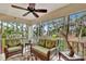 Spacious screened porch overlooking lush greenery at 5248 Marshfield Ln # 2, Sarasota, FL 34235