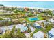 Aerial showing home near beach, tennis court, and other houses at 541 Edlee Ln, Longboat Key, FL 34228