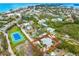 Aerial view of property near tennis court and beach at 541 Edlee Ln, Longboat Key, FL 34228