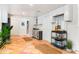 Well-equipped bar area with white cabinets, a wine rack, and a beverage cart at 541 Edlee Ln, Longboat Key, FL 34228