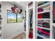 Large walk-in closet with ample shelving and hanging space at 541 Edlee Ln, Longboat Key, FL 34228