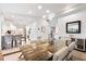 Open concept dining room with a view into the kitchen area at 541 Edlee Ln, Longboat Key, FL 34228