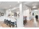 Modern kitchen with white cabinets, quartz countertops, and stainless steel appliances at 541 Edlee Ln, Longboat Key, FL 34228