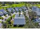 Aerial view of houses and community streets at 5532 Country Club Way, Sarasota, FL 34243