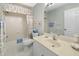 Clean bathroom with shower/tub combo and vanity at 5532 Country Club Way, Sarasota, FL 34243