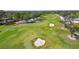 Golf course with sand traps and trees at 5532 Country Club Way, Sarasota, FL 34243