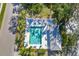 Aerial view of community pool with surrounding landscaping at 5532 Country Club Way, Sarasota, FL 34243