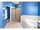 Bathroom with soaking tub and separate shower at 5715 Spanish Point Ct, Palmetto, FL 34221