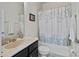 Bathroom with tub shower, vanity and updated fixtures at 5715 Spanish Point Ct, Palmetto, FL 34221