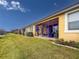 Row of houses with screened porches overlooking a pond at 5715 Spanish Point Ct, Palmetto, FL 34221