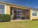 Close up of screened porch with patio furniture at 5715 Spanish Point Ct, Palmetto, FL 34221