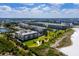 Aerial view of Gulf Bay Club, highlighting the resort's multiple buildings and lush grounds at 5780 Midnight Pass Rd # 609, Sarasota, FL 34242