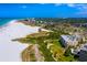 Aerial view of Gulf Bay Club and its beachfront location at 5780 Midnight Pass Rd # 609, Sarasota, FL 34242