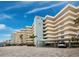 Condo building with parking and ocean view at 5780 Midnight Pass Rd # 609, Sarasota, FL 34242