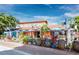 Tropical restaurant with outdoor seating and vibrant colors at 5780 Midnight Pass Rd # 609, Sarasota, FL 34242