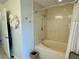 Bathroom with shower/tub combo and updated fixtures at 6101 34Th W St # 28B, Bradenton, FL 34210