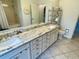 Double vanity bathroom with granite countertops at 6101 34Th W St # 28B, Bradenton, FL 34210