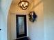 Inviting entryway with a decorative wreath and a stylish door at 6101 34Th W St # 28B, Bradenton, FL 34210