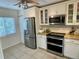 Updated kitchen with stainless steel appliances and granite countertops at 6101 34Th W St # 28B, Bradenton, FL 34210