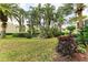 Lush landscaping with a central fountain creates a serene courtyard at 6101 34Th W St # 28B, Bradenton, FL 34210