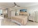 Spacious main bedroom with king-size bed and patio access at 6101 34Th W St # 28B, Bradenton, FL 34210