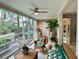 Relaxing sunroom with wicker furniture and plenty of natural light at 6101 34Th W St # 28B, Bradenton, FL 34210