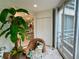 Bright sunroom with wicker furniture and large window at 6101 34Th W St # 28B, Bradenton, FL 34210